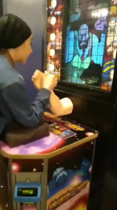 Breaking your arm with an arm-wrestling game.