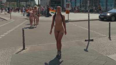 Showing off her tattoos to the whole city