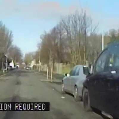 Police in the United Kingdom chase down a gunman and arrest him, he was roaming the streets with a fully loaded revolver. The police only had a taser.