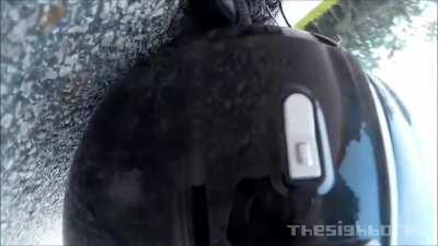 Biker hits boar at speed in Malaysia