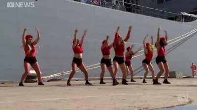 WCGW hiring a dance group for the formal commissioning of an Australian Naval ship, without checking out their dance moves prior to the ceremony?