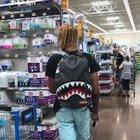 Walking around saying random things to people in WalMart. He’s so funny haha