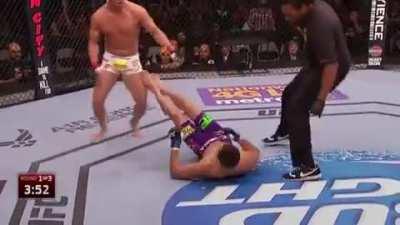Daron Cruickshank floors Jorge Masvidal with a right hand, that Masvidal somehow recovers from