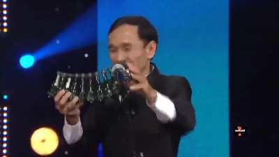 Playing song with soda bottles