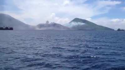 Volcanic eruption produces a shockwave that blows clouds away.