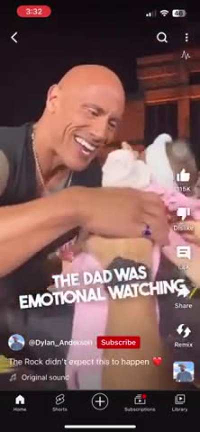  Dad passes newborn through strangers in a concert
