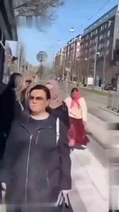 Woman shits and hands and throws that another woman