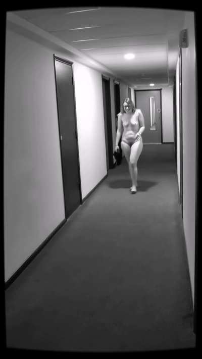 I found this old clip on my phone. I was dared to get naked in a hotel corridor and was so nervous