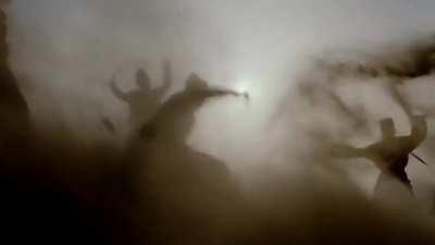 One of the greatest shots in wuxia history, from the desert storm fight in New Dragon Gate Inn (1992). A tiny budget, no cgi, an unsteady camera rolling down a hill.