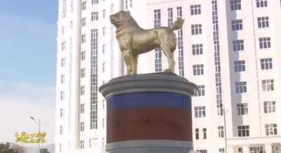 President of Turkmenistan unveils giant golden statue of his favorite dog. At this point, why not.