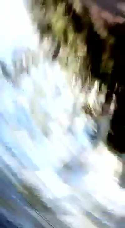 Let me shoot this video of me riding a Scooter on the way to the beach