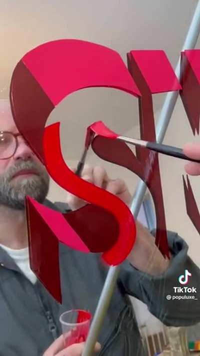 This guy painting these words by hand is deliciously satisfying