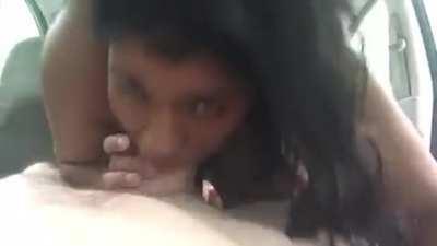 Black chick is sucking an thick white dick.