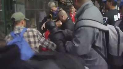 East vs West. Chinese fighting outside of their great emperors hotel. 