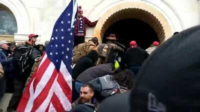 Leaked from Parler: Back the Blue lynches a policeman. Close up view of Republican's 01-06-21 insurrection mob as they crush an officer while yelling things like 