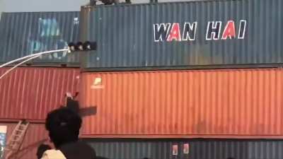 Pakistani Army pushed a man off a 25ft container during an Imran Khan protest.