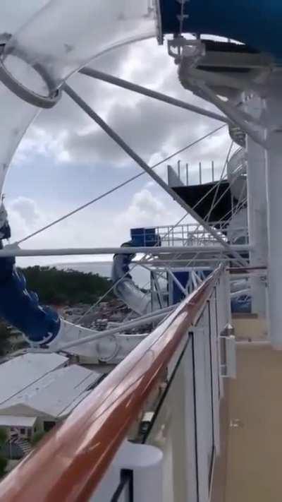 Man needs more speed on a water slide.