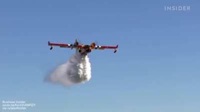Cockpit view from a Super Scooper as it fights wildfires