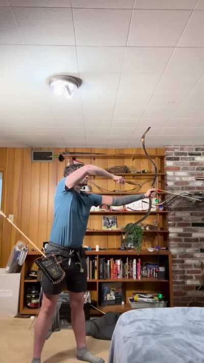 Indoor evening thumb draw release practice- 72lbs