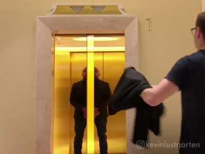 Men walking into elevator (perfect loop)