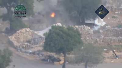 Ahrar al-Sham fighters hit a BMP with a Metis causing it catch fire. Latakia. June 10th, 2015.