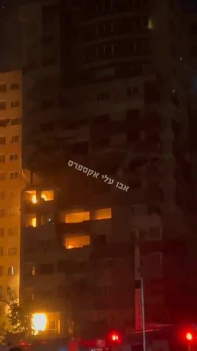 Aftermath of an Israeli strike on an apartment in Tehran, Iran.