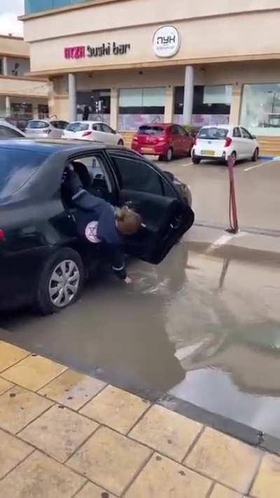 Person attempts to get in car