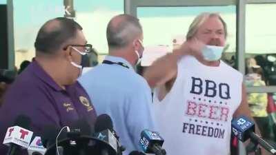 Crazy conspiracy guy interrupts news interview