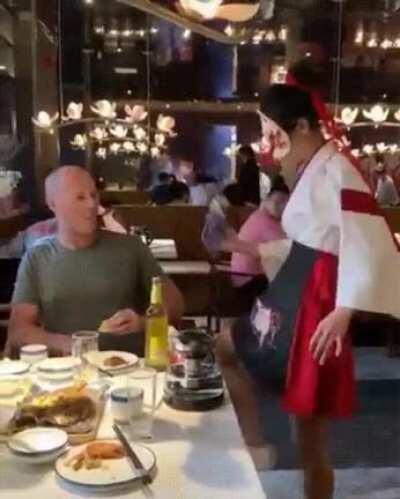 The way she flashes the hand at the end.