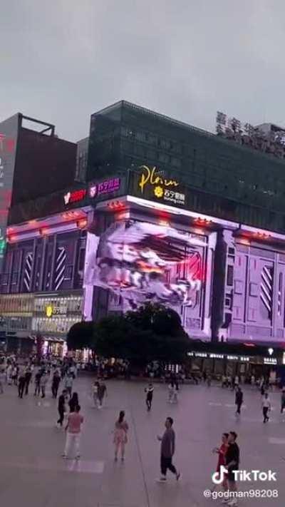 This trippy LED advertisement on the street