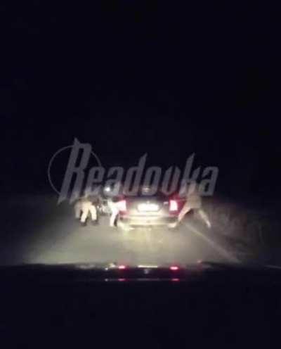 Translation from the telegram chat description: “Azov militants shoot civilians right on the highway near Mariupol. Really scary video”