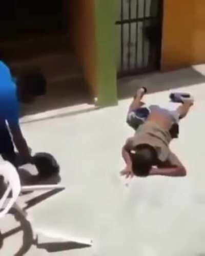 DBS doing a back flip off a plastic chair