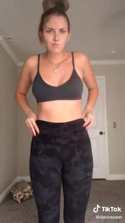 Showing off tummy, hips and tan lines