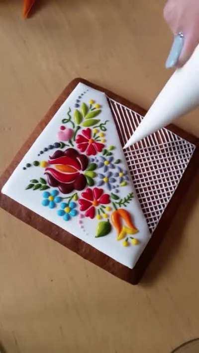 Embroidery style icing on a cookie
