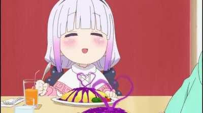 A smiling Kanna while eating omurice...
