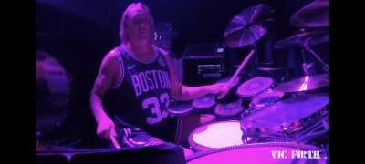 Danny Carey aka the octopus from the band TOOL, playing insane polyrhythms in their song Pneuma (drum cam video of the whole song on YouTube). It gets crazier the longer you watch.