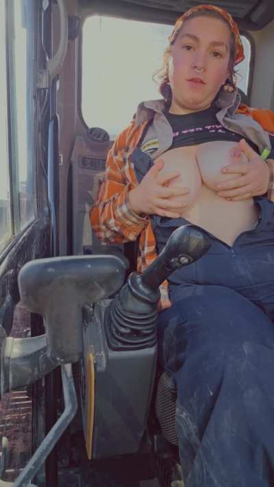 Tits out in an excavator at work F25