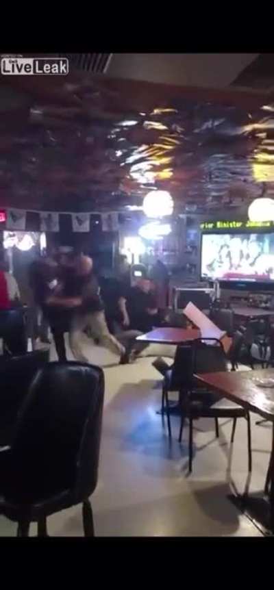 Karen slaps a cop who's arresting someone and gets tackled.