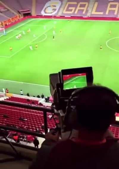 Incredibly skilled Camera operator recording a soccer match
