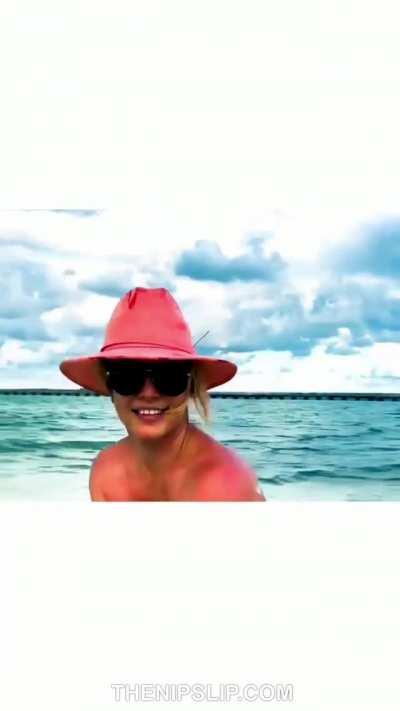 Britney Spears Nipple Slips and Posing in a Hand Bra