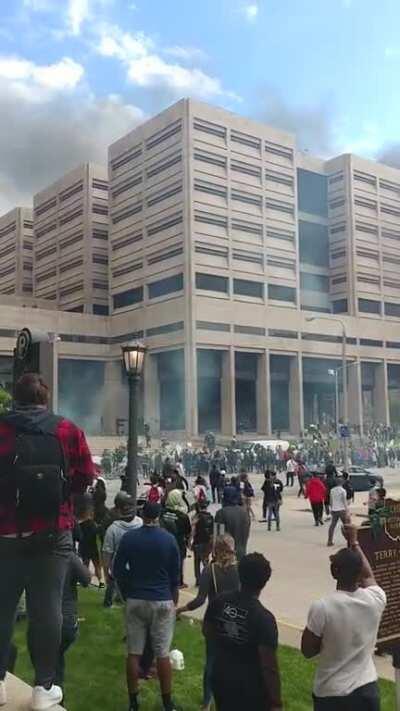 I want the world to know that the violence was on both sides. A bunch of us were peacefully standing/sitting in this corner and a cop shot tear gas at us for ABSOLUTELY no reason.