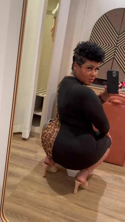 Body Tight In A Half Leopard Print Dress.