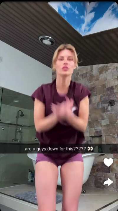 Showing off in her bathroom