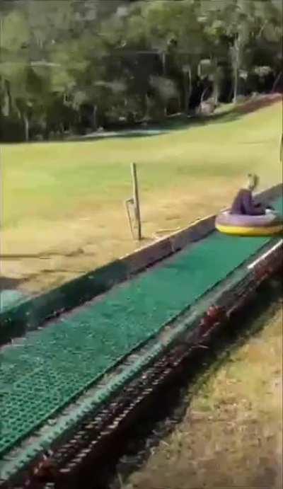 Sliding into ball pit balls.