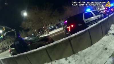 Runs red light, rear ends cop