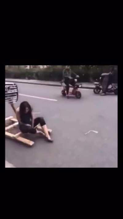 attempting to tow a woman with rubber bands