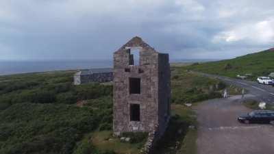 To fly a drone through a window