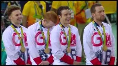 Bradley Wiggins sticks his tongue out during national anthem
