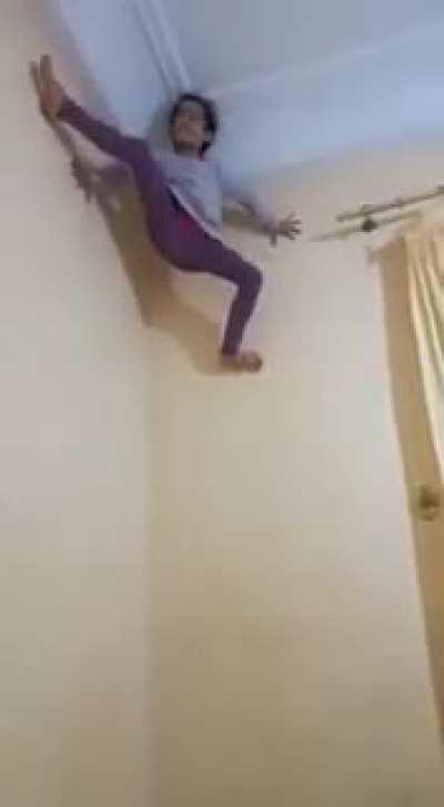 Algerian Girl climbing the wall