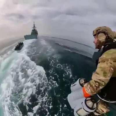 Marines perform boarding exercises with JETPACKS and landing on a high-speed ship. The future is now, old and young man